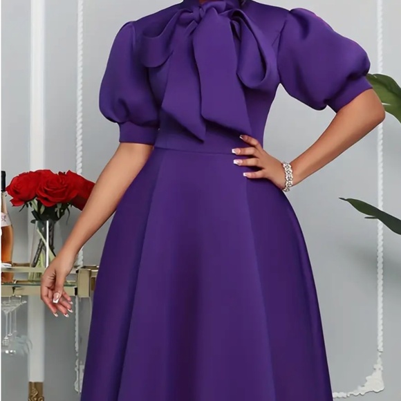 Elegant Peplum Knit Dress - Picture 1 of 6